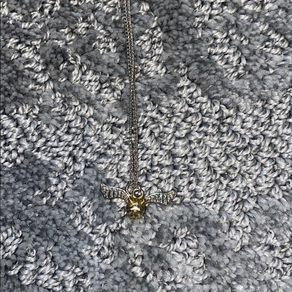 Gold snitch necklace